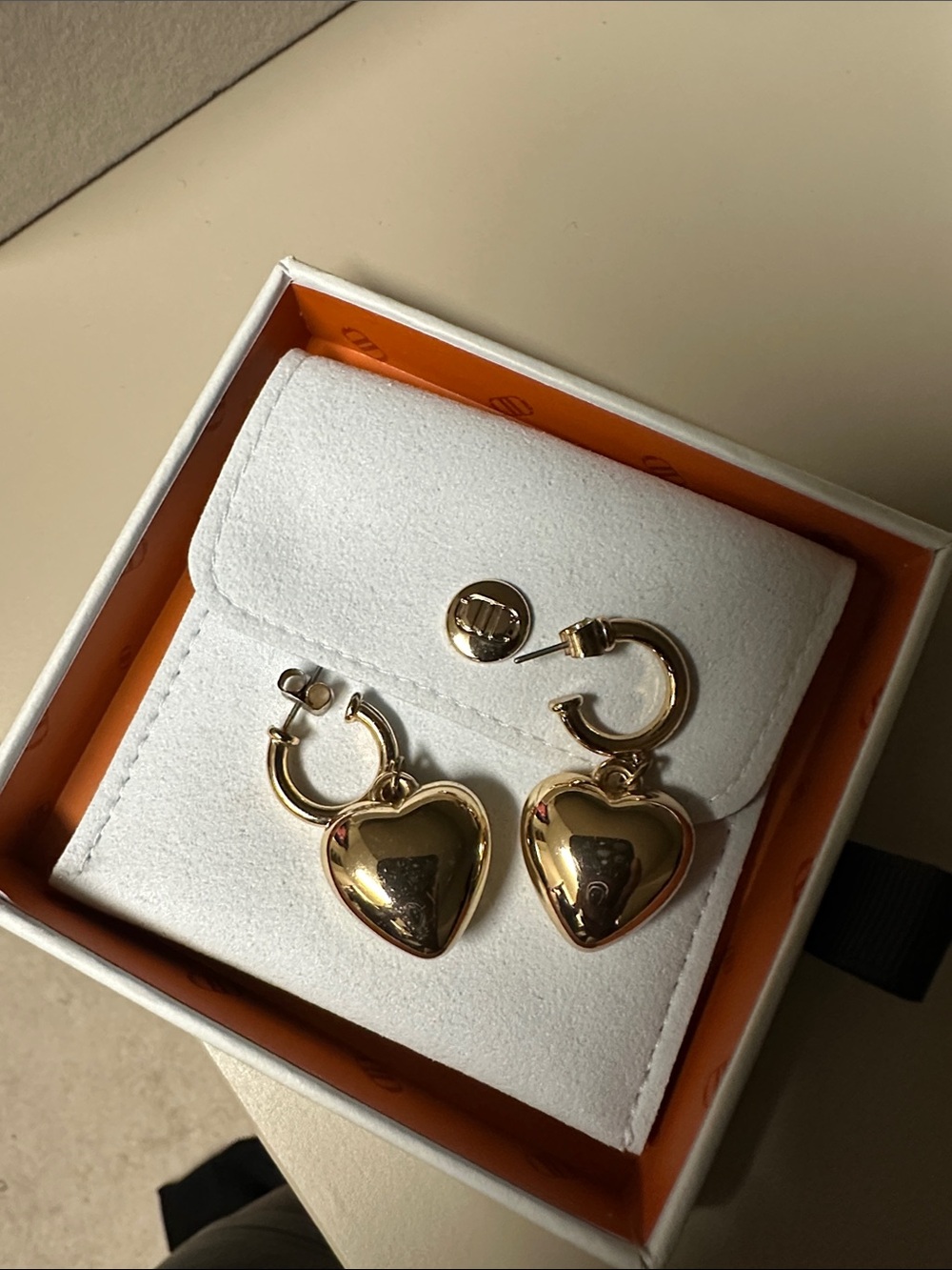 Gold tone heart hoops